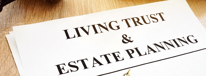 Living trust and estate planning form on a desk.
