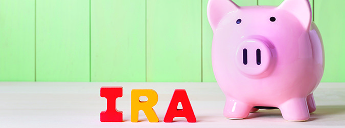 IRA theme with wood block letters and piggy bank