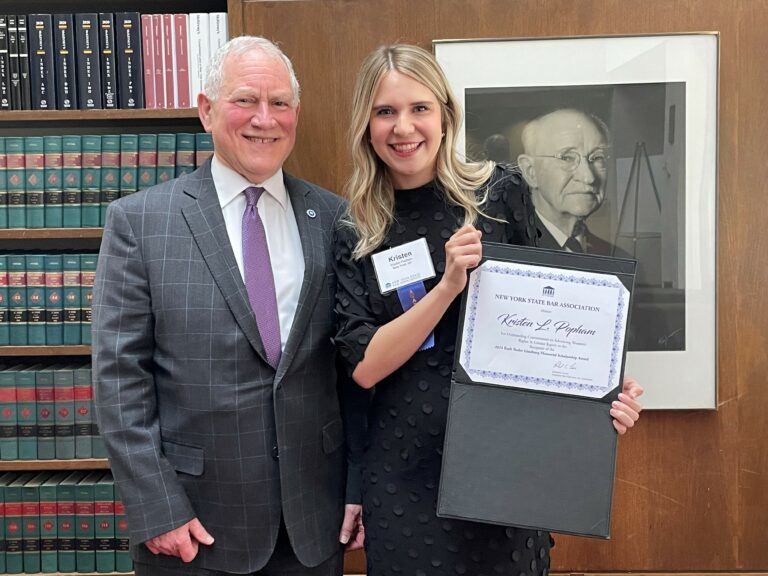 President Richard Lewis and Ruth Bader Ginsburg Memorial Scholarship Winner Kristen Popham. 