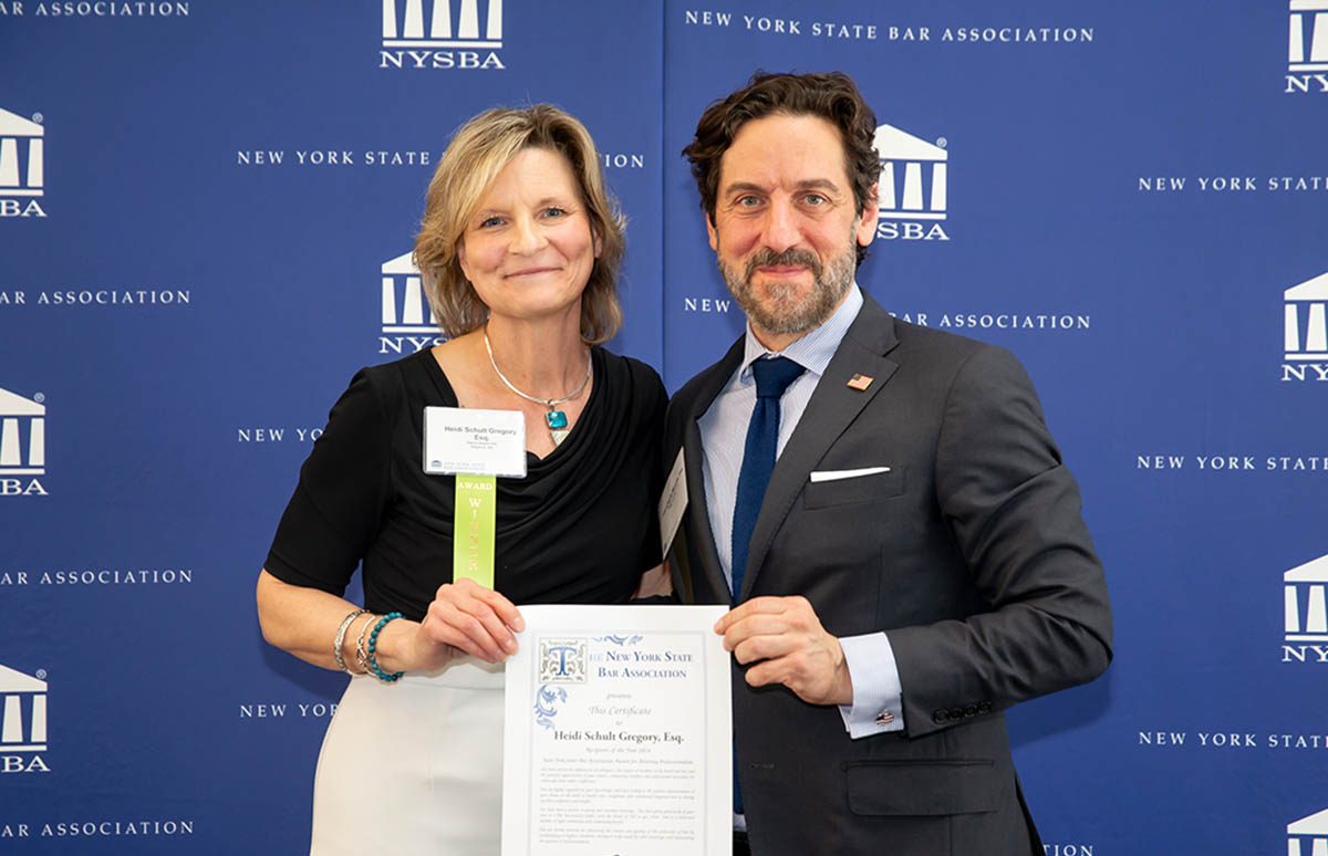 2024 New York State Bar Association Attorney Professionalism Award Winner Heidi Schult Gregory (left) with Jean-Claude Mazzola, chair of the Committee on Attorney Professionalism at the Bar Center in Albany, N.Y. on May 1, 2024.