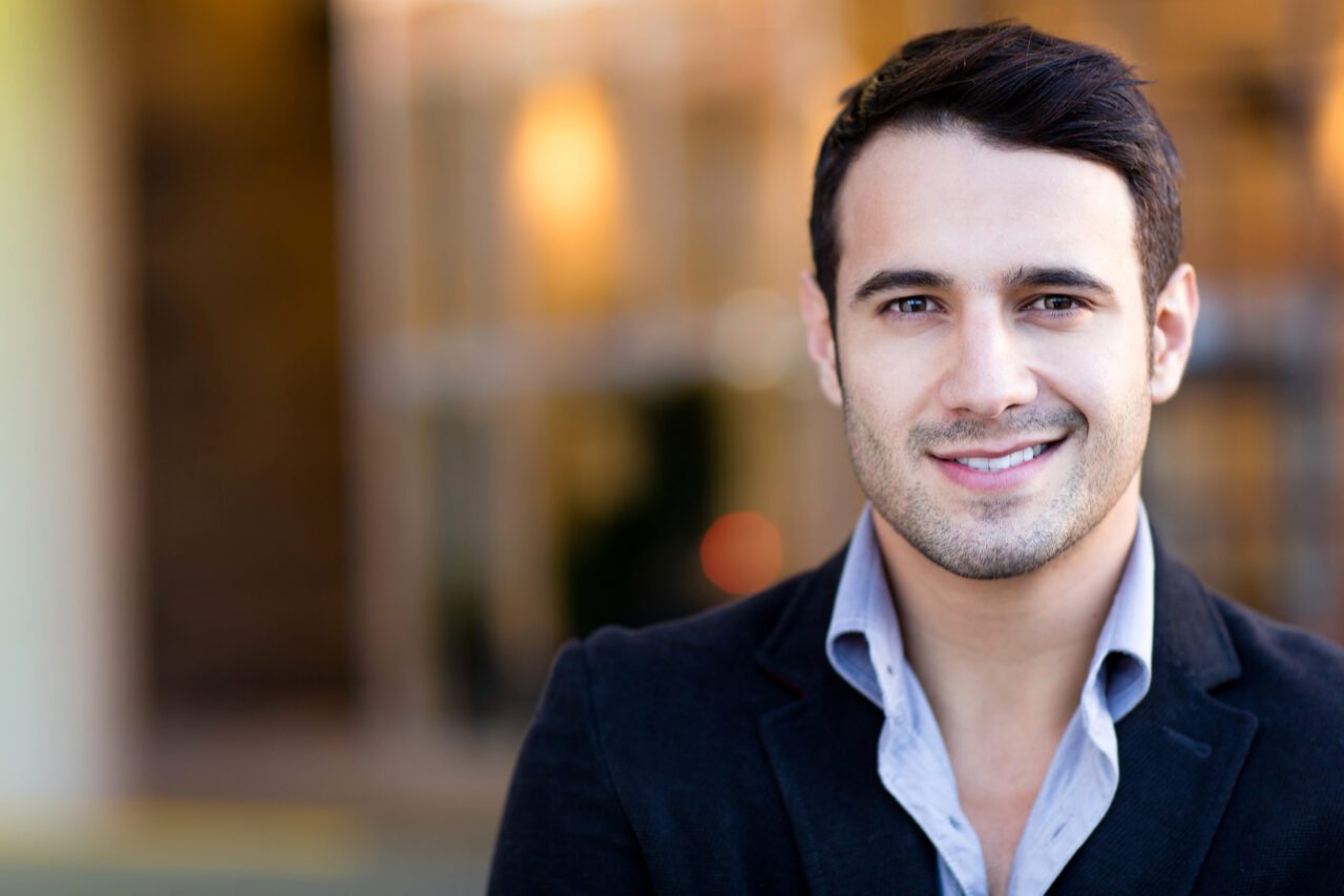 Portrait,Of,A,Handsome,Casual,Businessman,Smiling