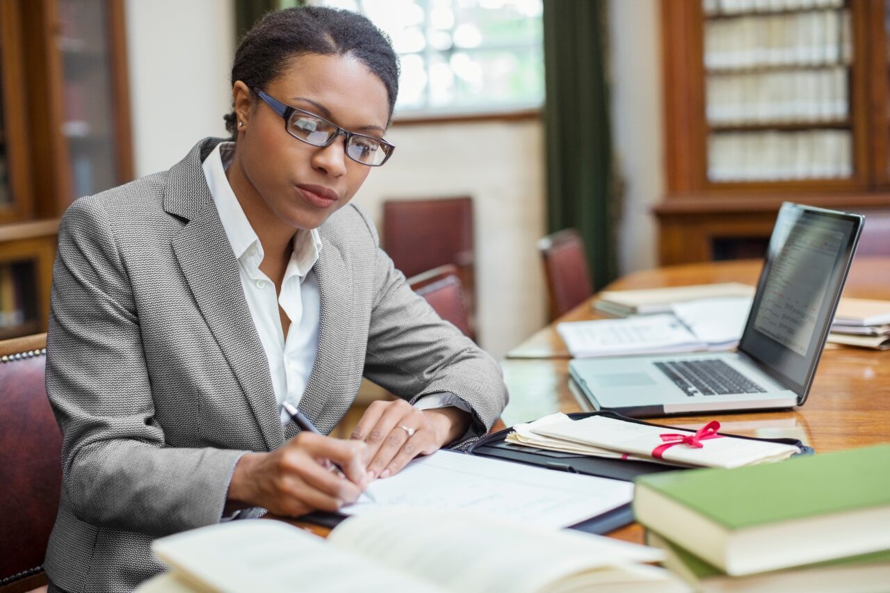 Lawyer,Taking,Notes,In,Chambers