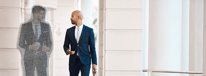 Business people, men and walking outdoor with conversation, travel and morning with attorney for discussion. Lawyers, communication and corporate professional in city for career in law and justice.