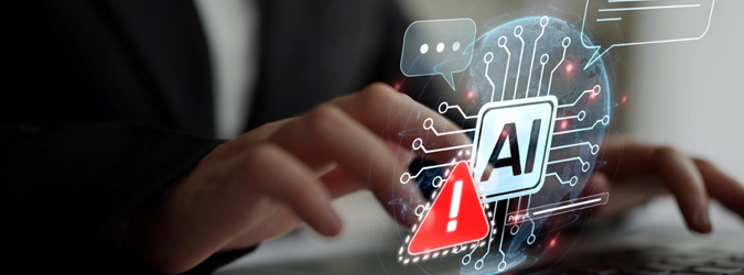 A person types on a keyboard with digital icons overlayed, including AI, chat bubbles, and a red warning symbol, suggesting artificial intelligence risks or alerts.